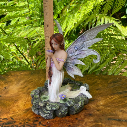 Fairy Holding Lotus Blossom