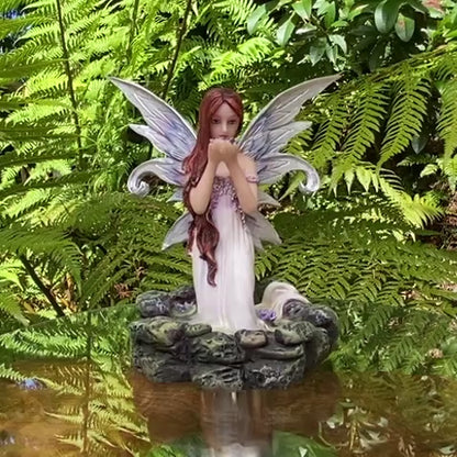 Fairy Holding Lotus Blossom