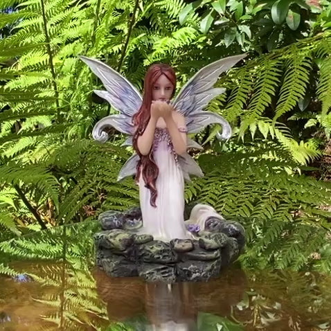 Fairy Holding Lotus Blossom